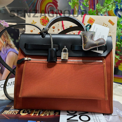Hermès Herbag 31 Canvas Shoulder Bag Orange Black Silver Hardware