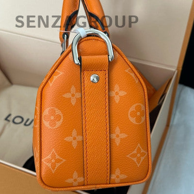 Louis Vuitton Taïga Calfskin Keepall 25 Orange Unisex Travel Bag