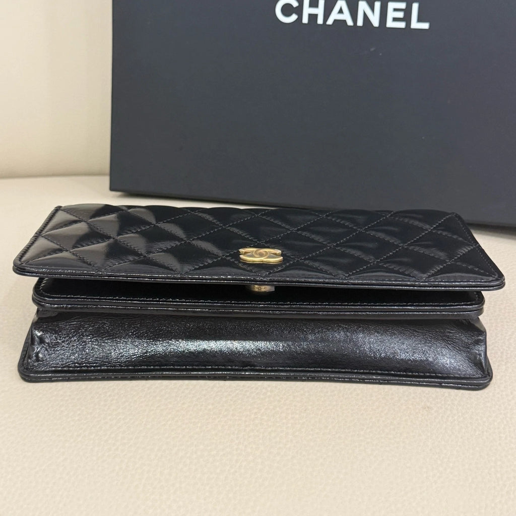 New CHANEL Black Quilted Waxed Leather Twist Chain WOC Crossbody Bag For Women