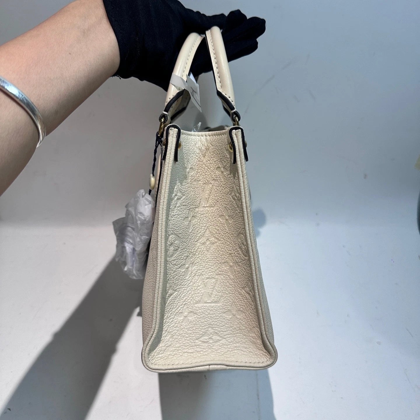Louis Vuitton Onthego PM Embossed Grainy Leather Tote For Women