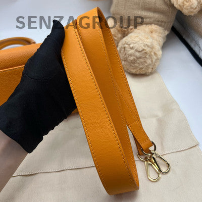 Louis Vuitton Orange Handbag with Gold Buckle - Classic & Stylish Women's Bag