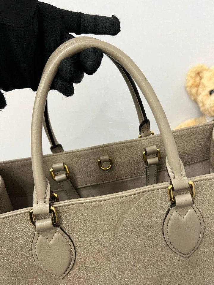 Louis Vuitton Embossed Leather MM OnTheGo Tote Bag For Women