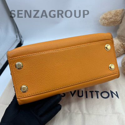 Louis Vuitton Orange Handbag with Gold Buckle - Classic & Stylish Women's Bag