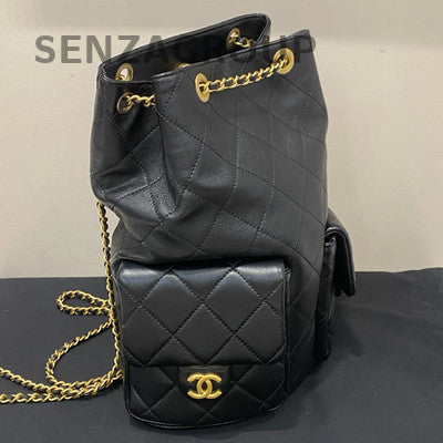 Chanel 25C Black Gold Drawstring Bucket Backpack Quilted Lambskin Classic