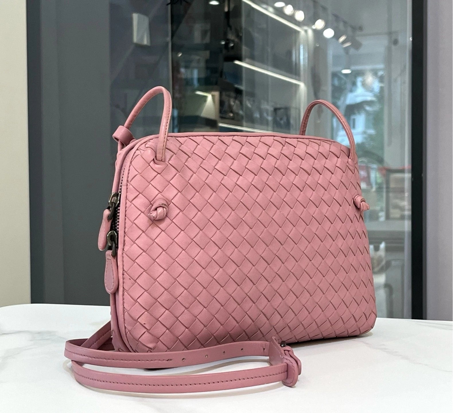 Bottega Veneta Pink Woven Crossbody Pillow Bag For Women