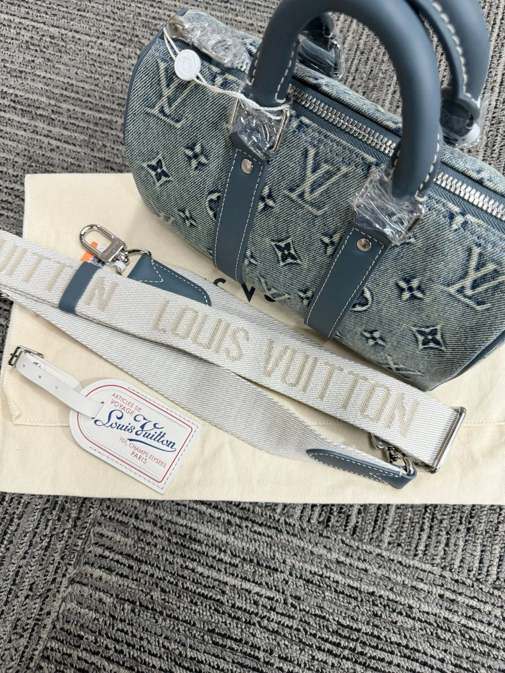 Louis Vuitton Keepall 25 Denim Logo Handbag For Women
