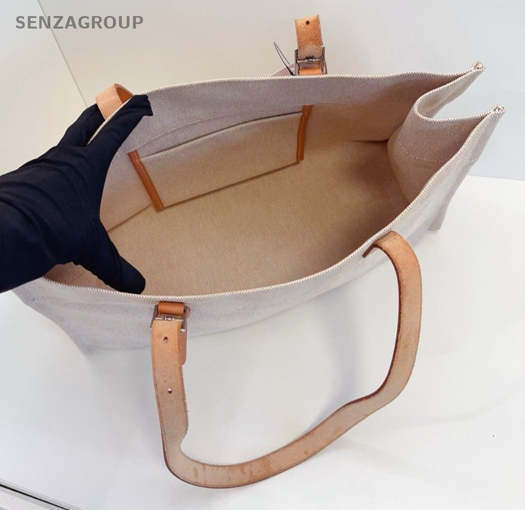 Hermes Etriviere Tote Beige Canvas with golden-brown leather shoulder strap