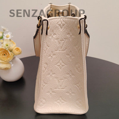 Louis Vuitton Onthego Monogram Empreinte Leather Tote Bag - White