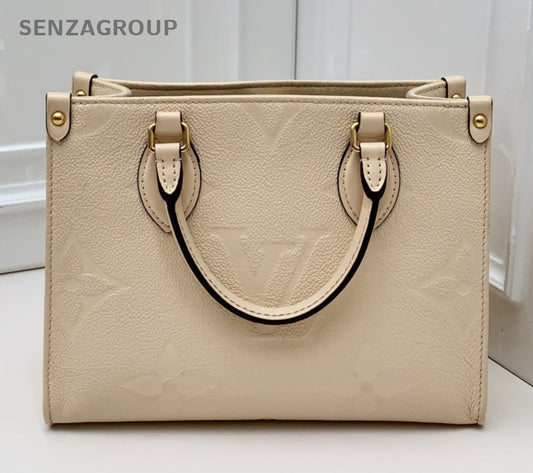Louis Vuitton OnTheGo Tote Calfskin Top Handle Bag Crossbody White Gold Women