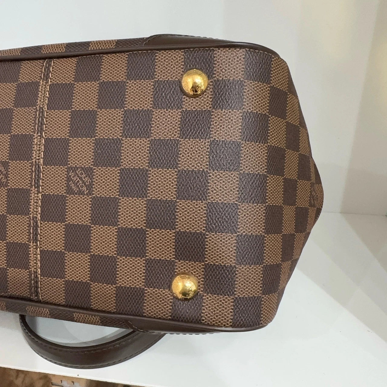 Louis Vuitton Logo Embossed Brown Leather Mini Dumpling Handbag For Women