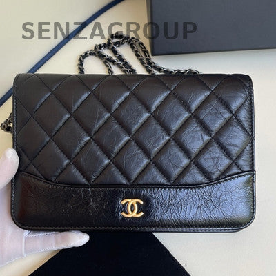 Chanel Classic Quilted WOC Wallet on Chain Black Gold Crossbody Bag