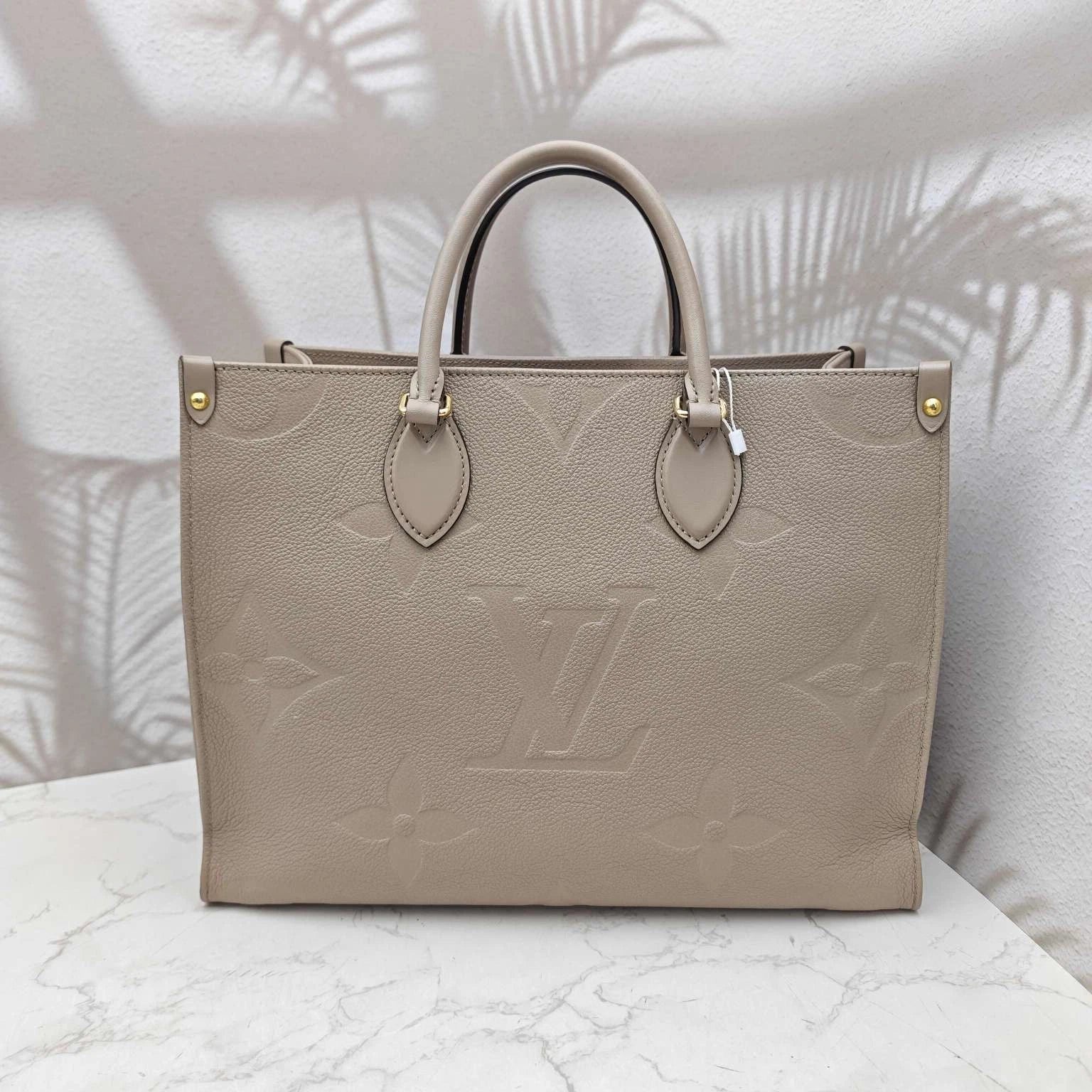 Louis Vuitton Grainy Calfskin Onthego Medium Tote Bag For Women