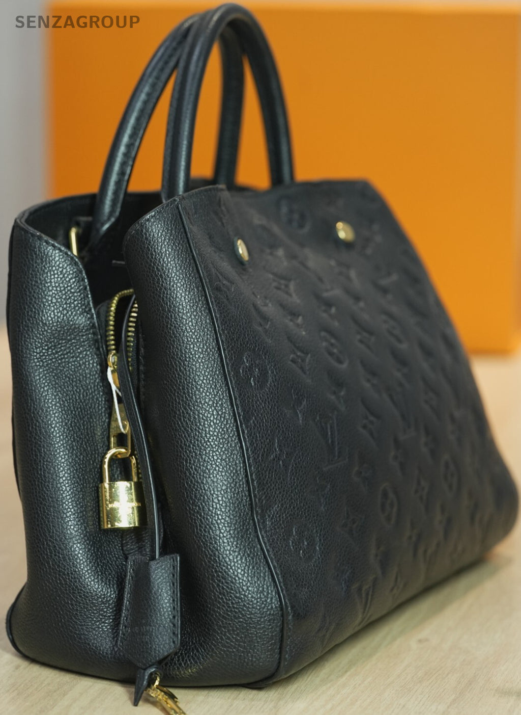 Louis Vuitton Monogram Empreinte Montaigne MM Shoulder Handbag