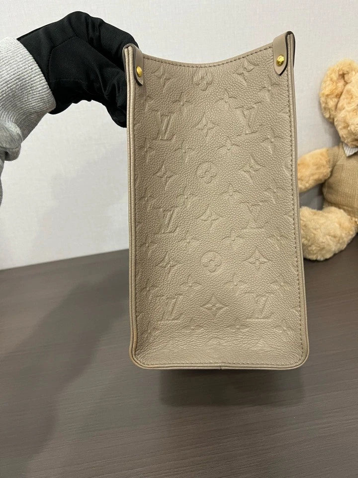 Louis Vuitton Embossed Medium On The Go Tote Bag For Women
