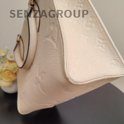 Louis Vuitton Onthego Monogram Empreinte Leather Tote Bag - White