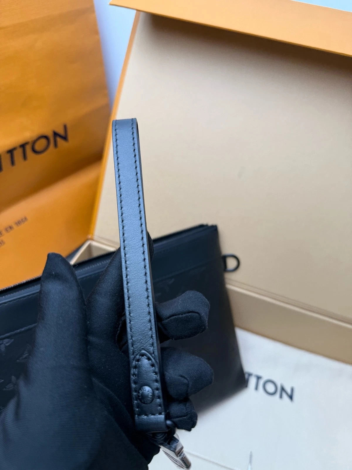 Louis Vuitton Black Monogram Embossed Leather Clutch Women