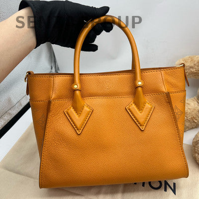 Louis Vuitton Orange Handbag with Gold Buckle - Classic & Stylish Women's Bag