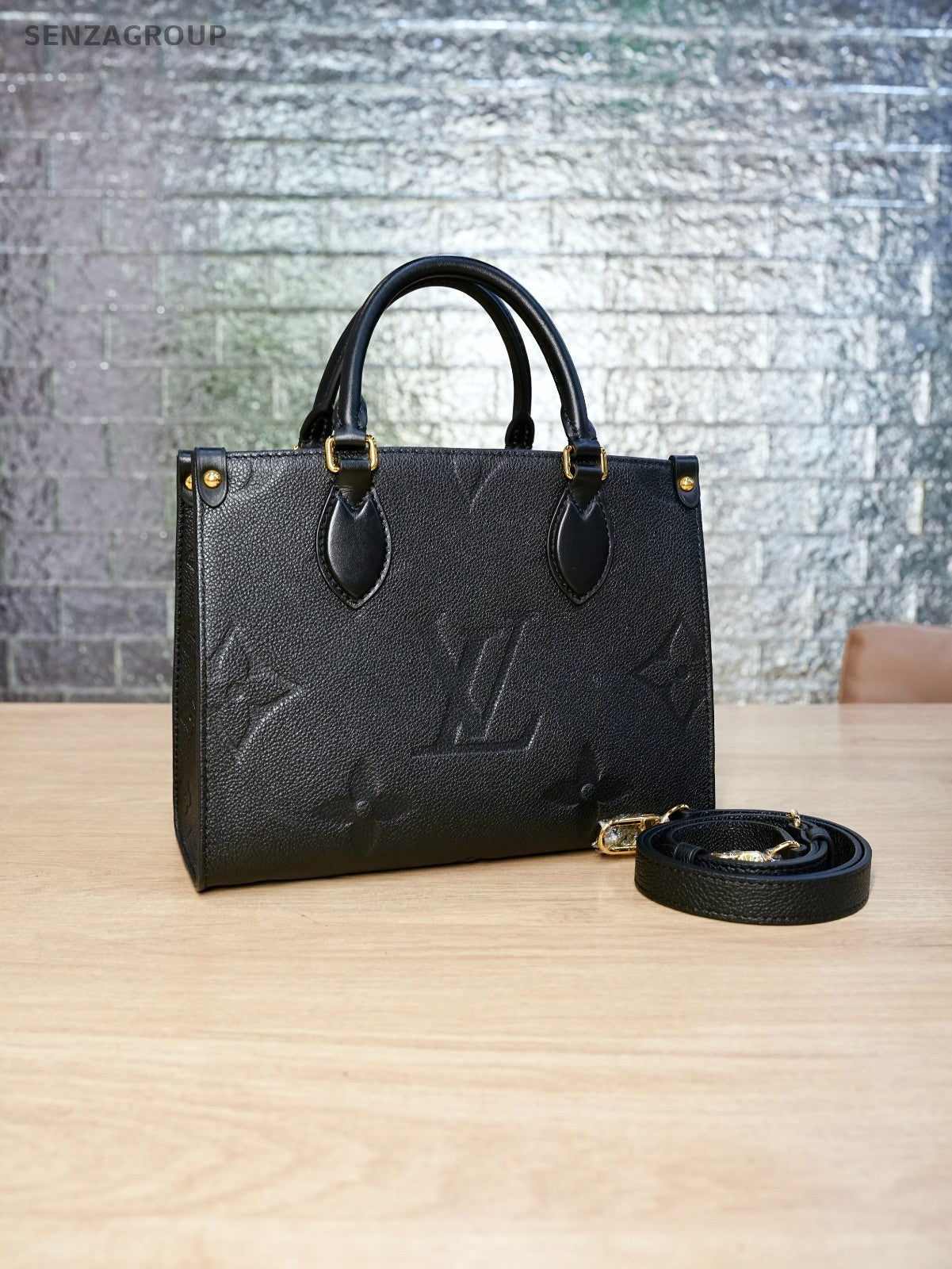 LOUIS VUITTON black Monogram Empriente ON THE GO PM almost brand new