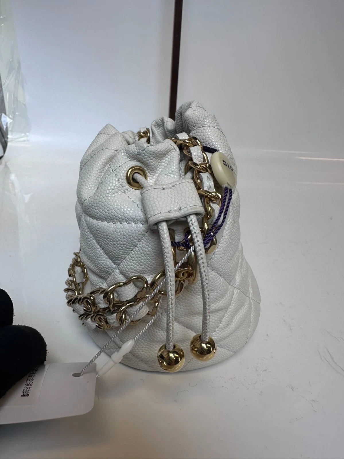 SJ0001 XP00108 Chanel 22K Mini Bucket Bag in White Caviar Leather