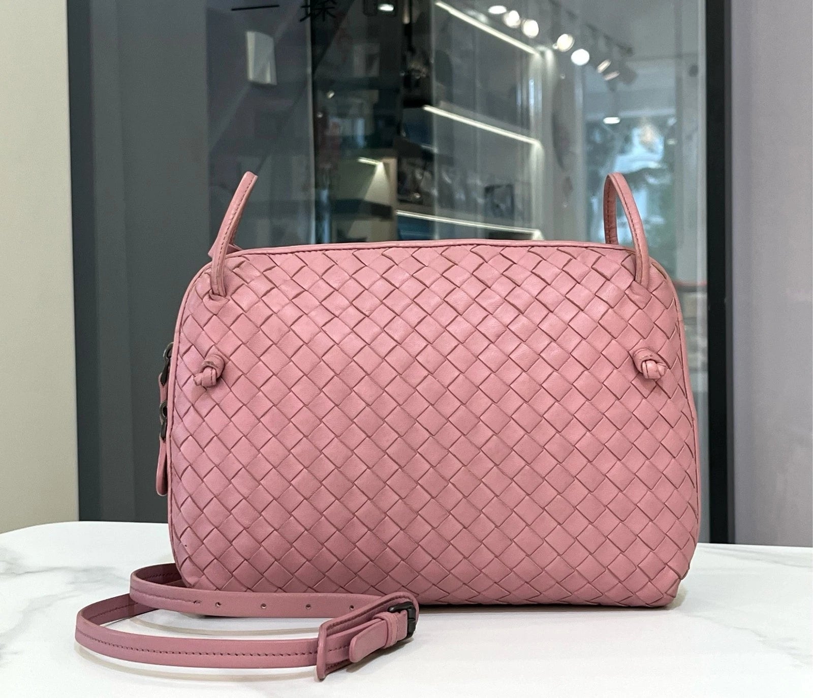 Bottega Veneta Pink Woven Crossbody Pillow Bag For Women