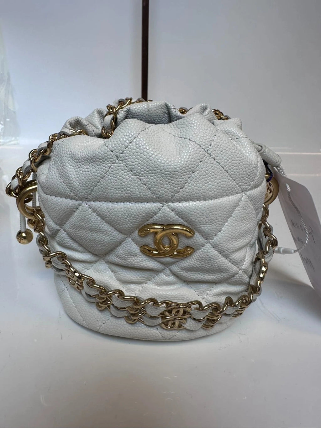 SJ0001 XP00108 Chanel 22K Mini Bucket Bag in White Caviar Leather