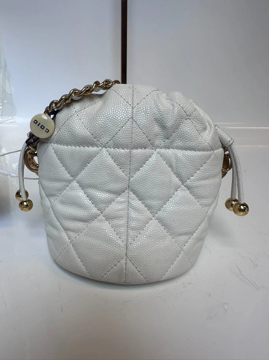 SJ0001 XP00108 Chanel 22K Mini Bucket Bag in White Caviar Leather
