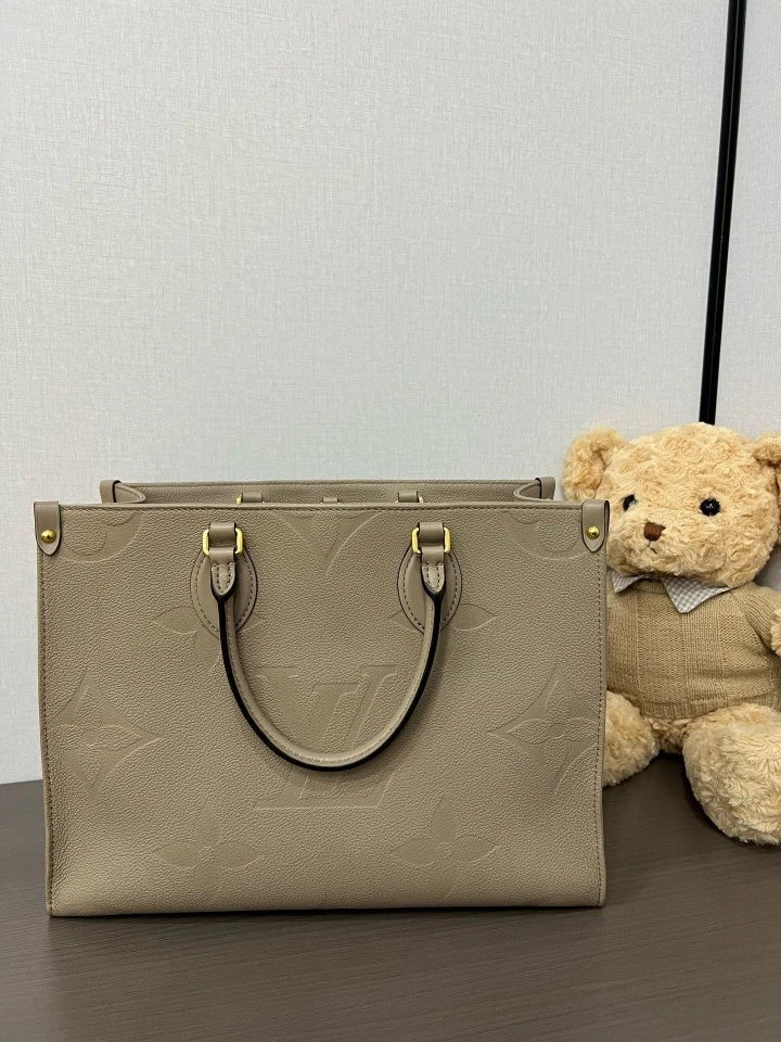 Louis Vuitton Embossed Leather MM OnTheGo Tote Bag For Women