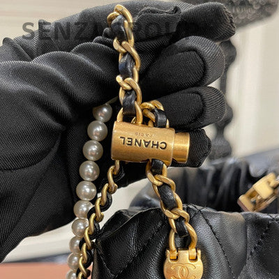 Chanel Quilted Pearl Drawstring Chain Bucket Bag Black Gold Shoulder Bag