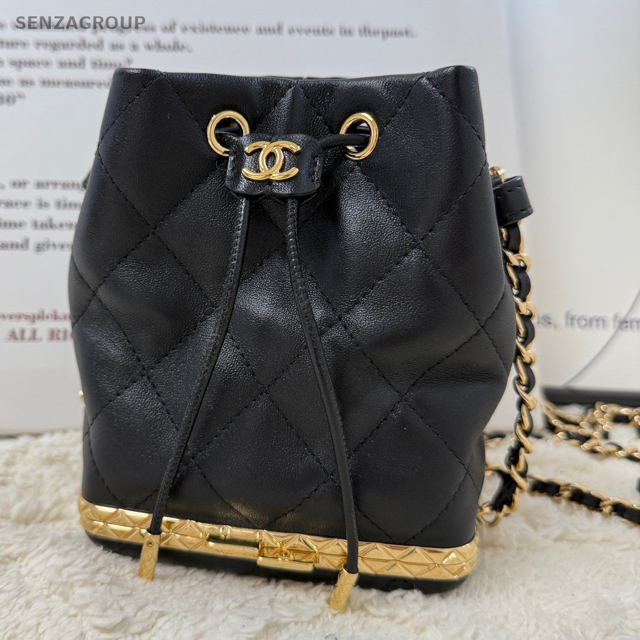 Chanel 22S Mini Bucket Bag Black Gold Quilted Lambskin Shoulder Crossbody