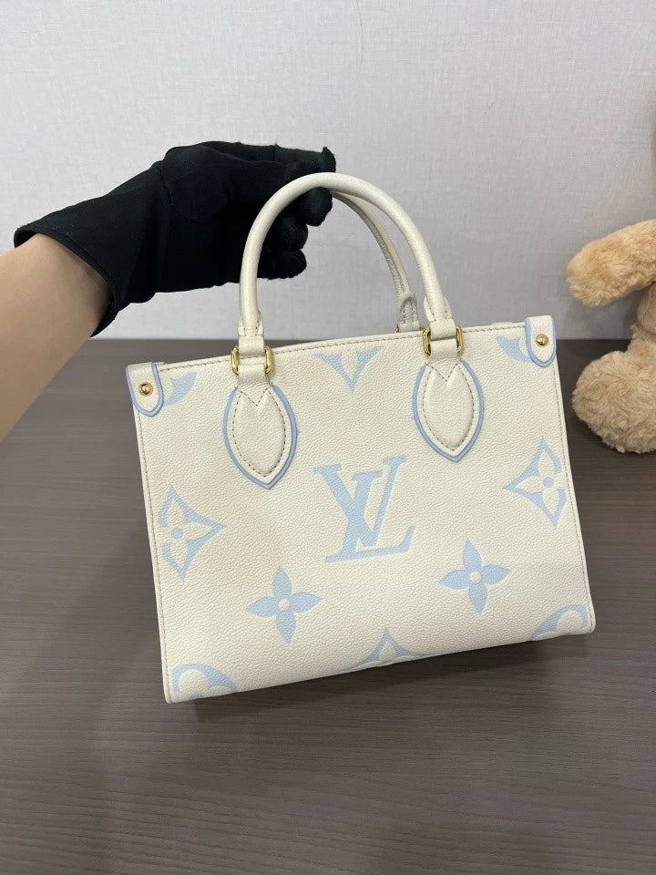 Louis Vuitton OnTheGo PM Empreinte Leather Tote Bag For Women