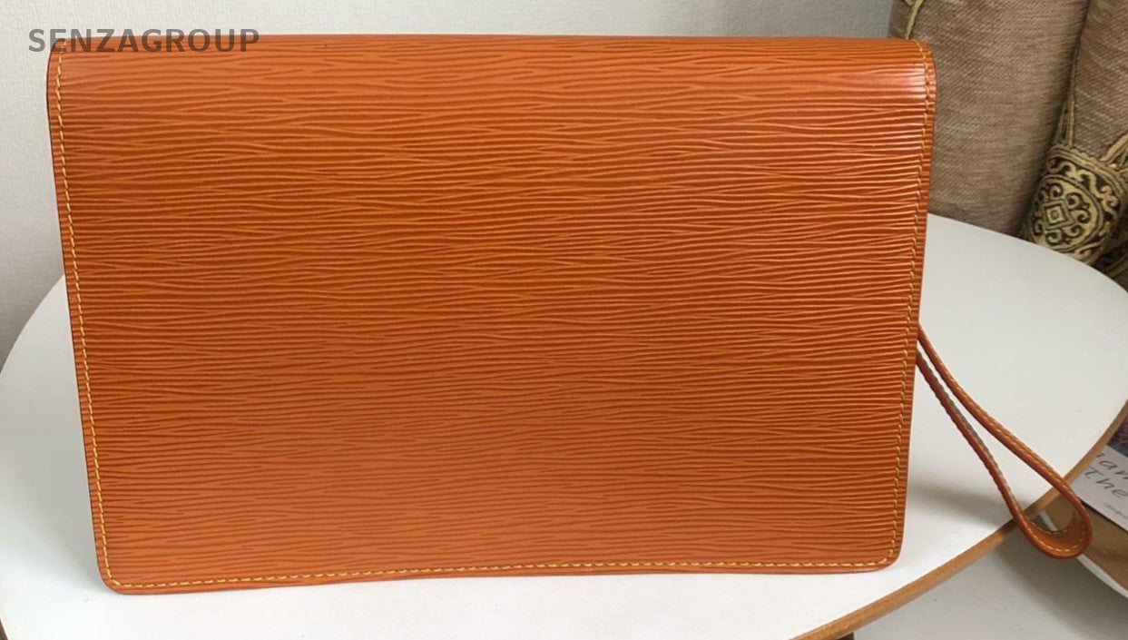 Louis Vuitton Epi Leather Handbag caramel color with Gold Women