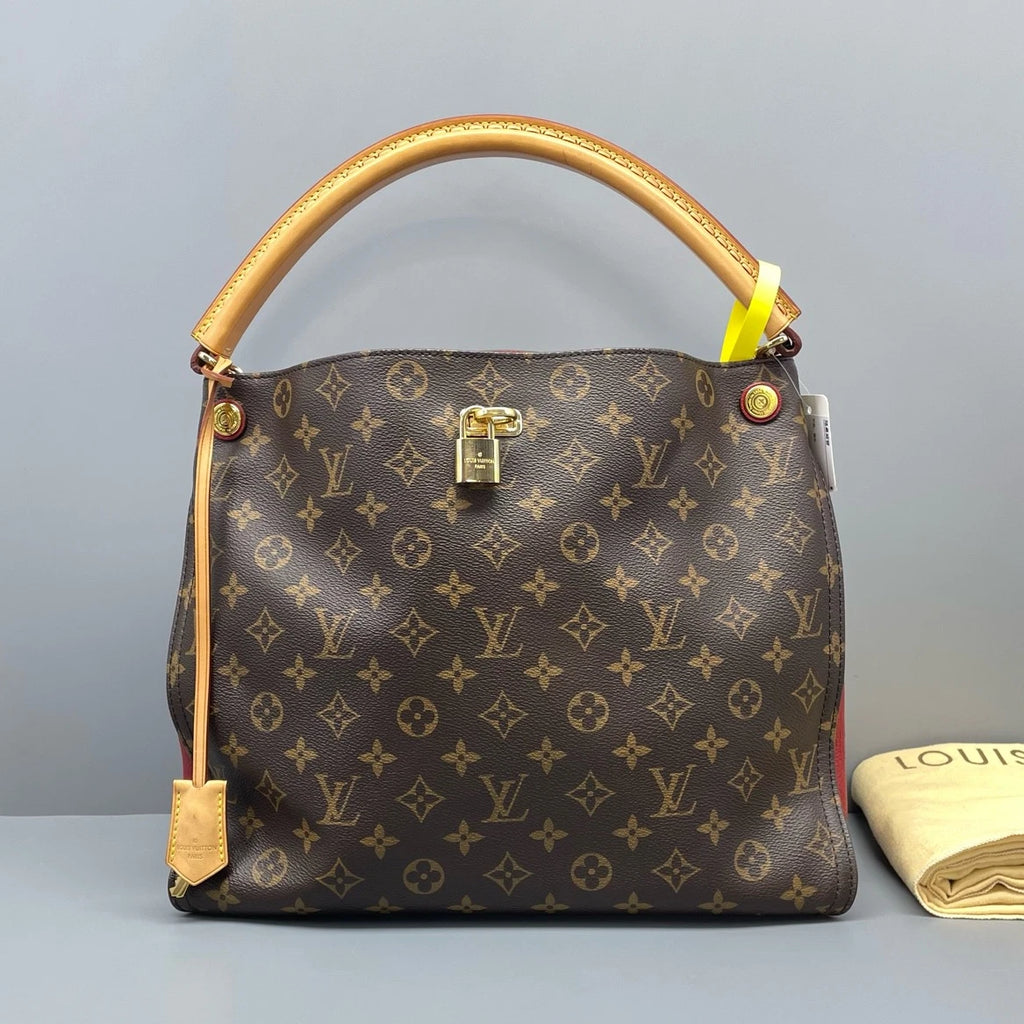 Louis Vuitton Gaia Monogram Canvas Brown Handbag Gold Hardware