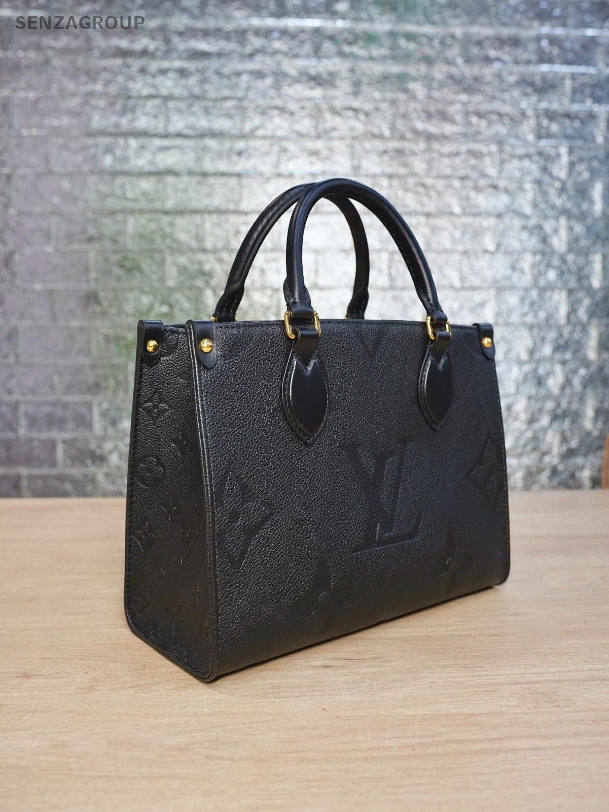 LOUIS VUITTON black Monogram Empriente ON THE GO PM almost brand new