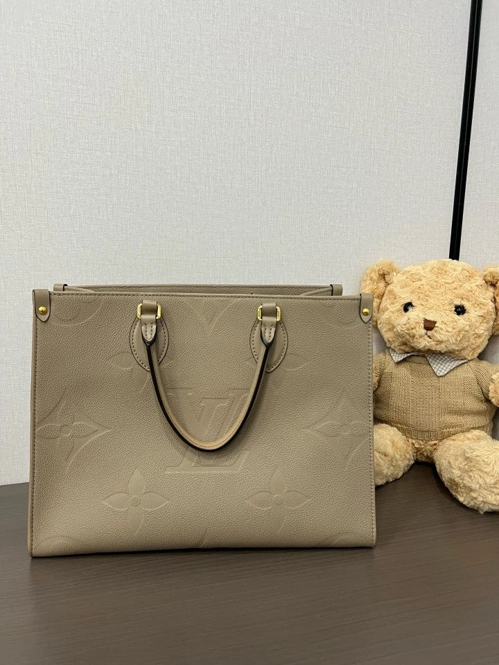 Louis Vuitton Embossed Medium On The Go Tote Bag For Women