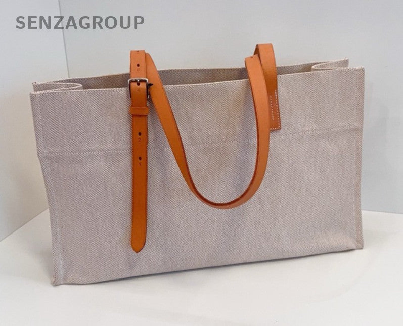 Hermes Etriviere Tote Beige Canvas with golden-brown leather shoulder strap