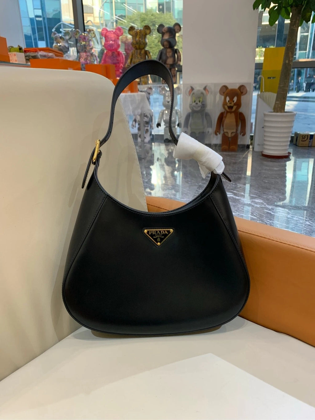 Prada Cleo Shiny Leather Dumpling Shoulder Bag For Women
