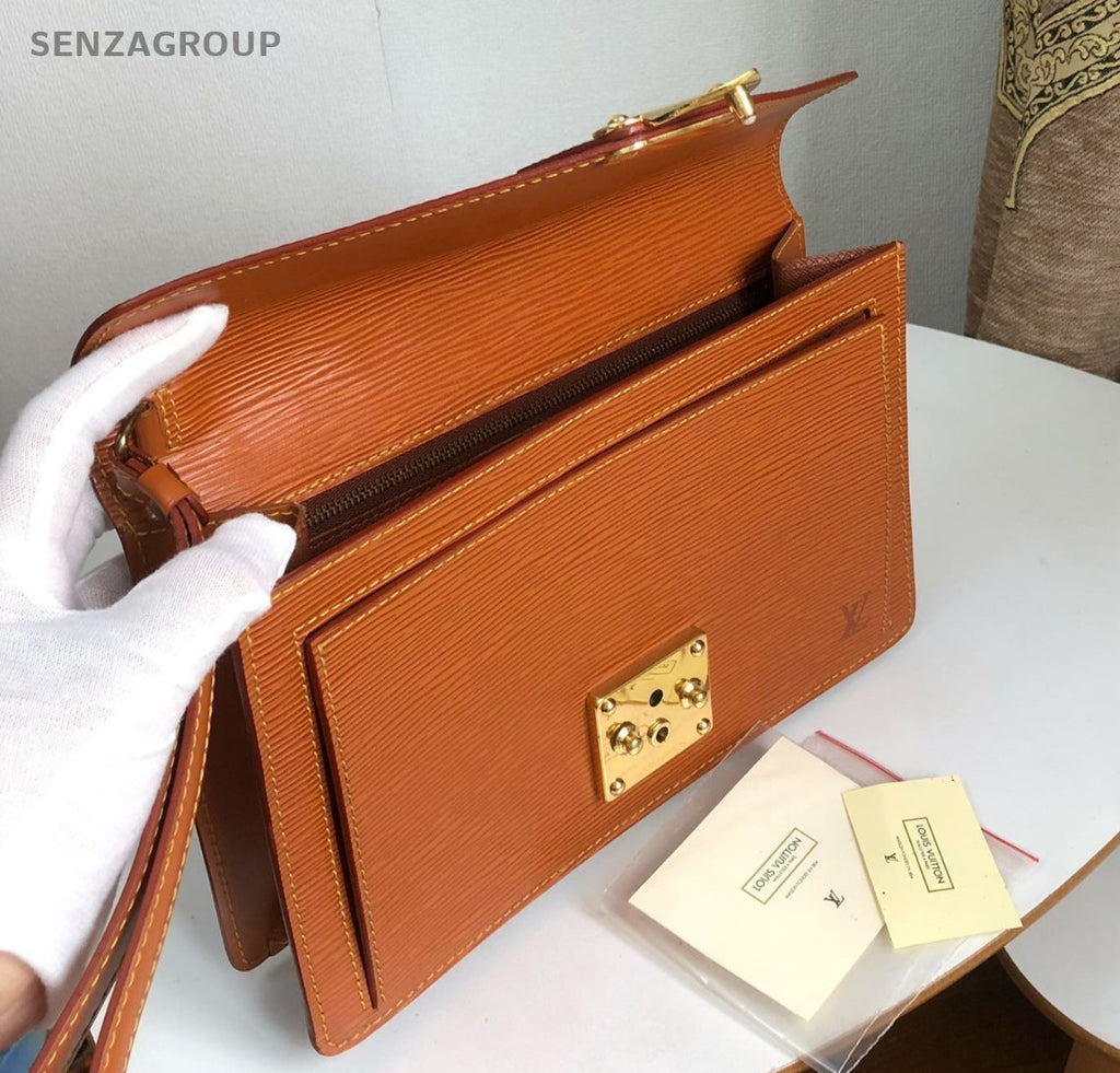 Louis Vuitton Epi Leather Handbag caramel color with Gold Women