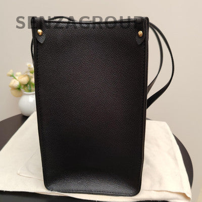 Louis Vuitton OnTheGo MM Monogram Giant Reverse Tote Bag