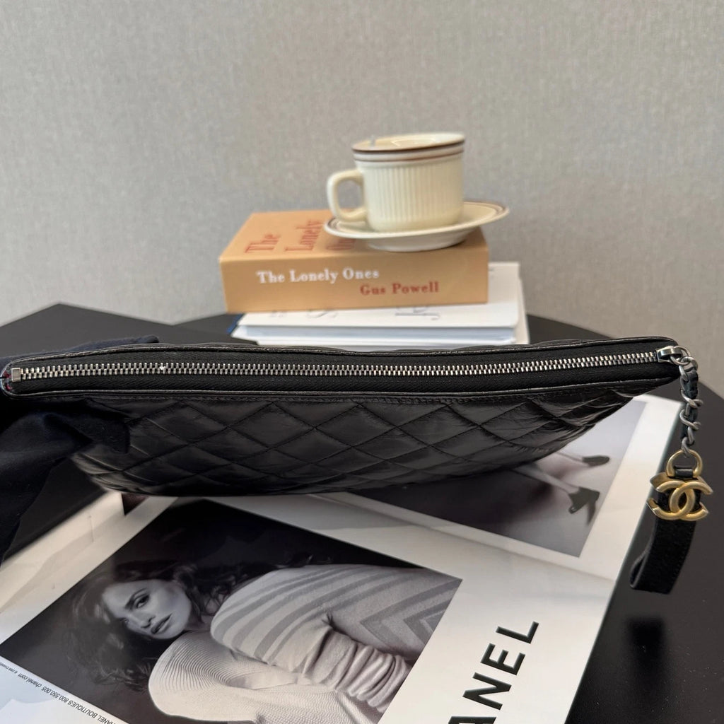 Authentic Chanel Calfskin MM Diamond Black Clutch Bag Gold Hardware