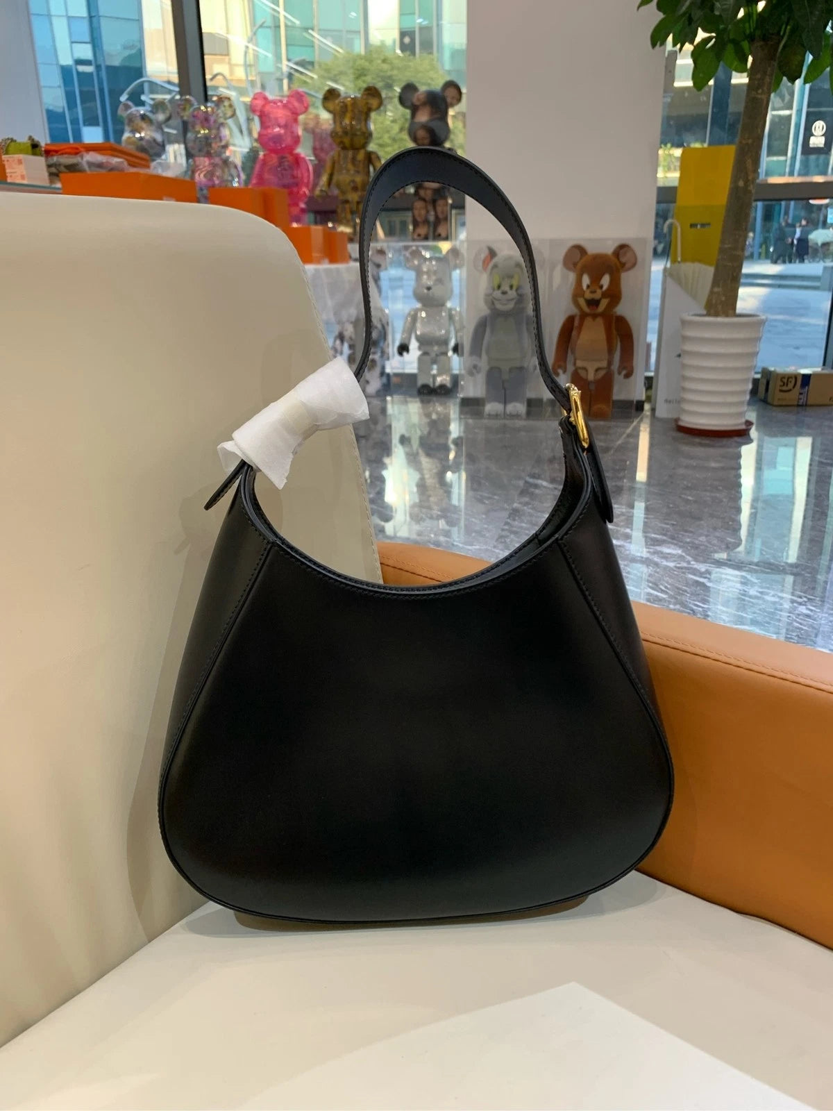 Prada Cleo Shiny Leather Dumpling Shoulder Bag For Women
