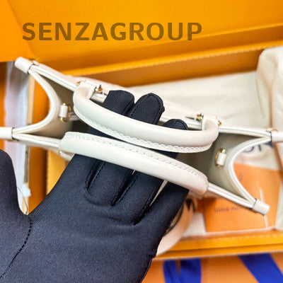 Louis Vuitton OnTheGo Monogram Empreinte Leather Small Tote Bag Women