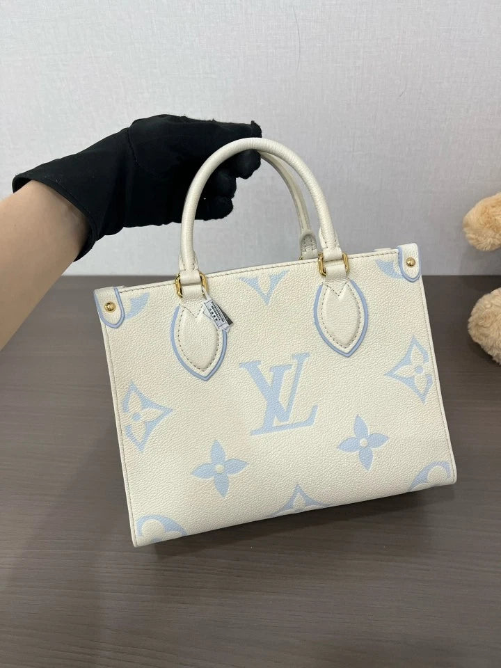 Louis Vuitton OnTheGo PM Empreinte Leather Tote Bag For Women