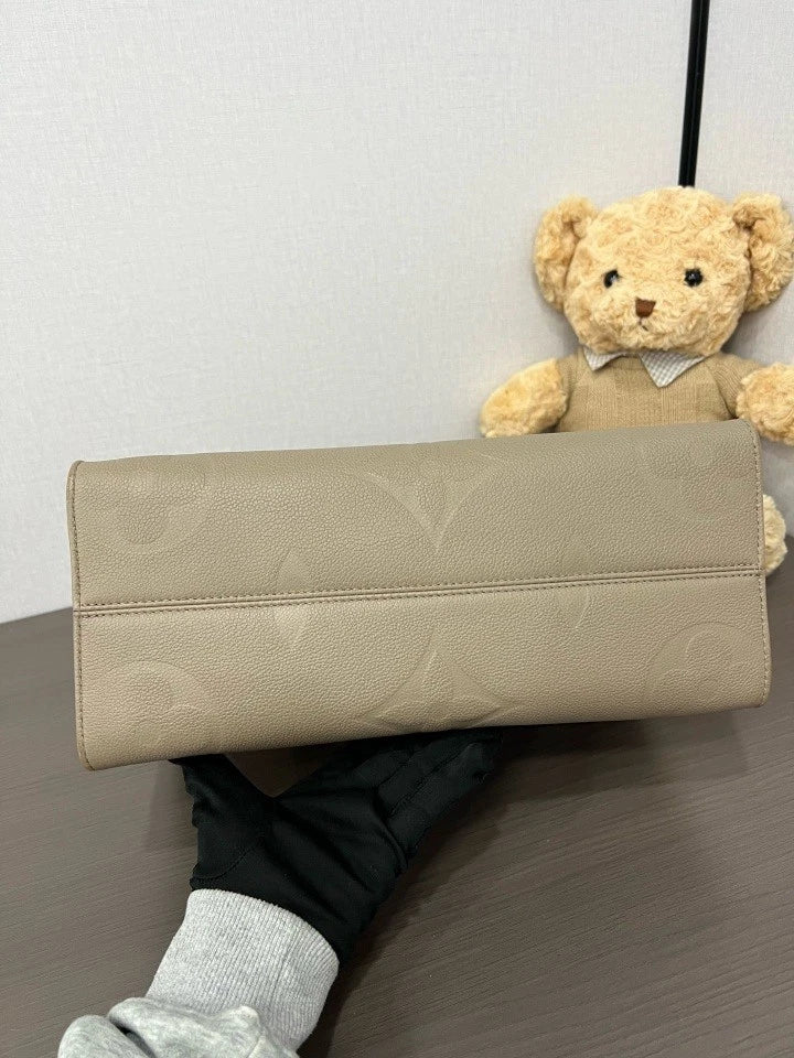 Louis Vuitton Embossed Medium On The Go Tote Bag For Women