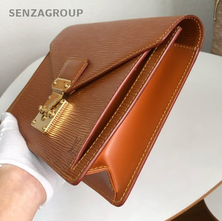 Louis Vuitton Epi Leather Handbag caramel color with Gold Women