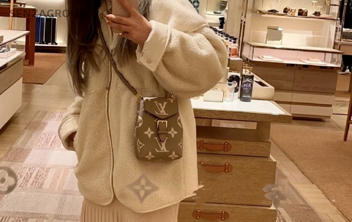 Louis Vuitton Tiny Backpack mini Elephant Grey Shoulder bag Almost BRAND NEW
