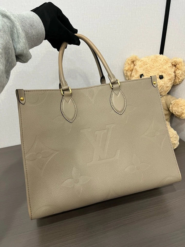 Louis Vuitton Embossed Medium On The Go Tote Bag For Women
