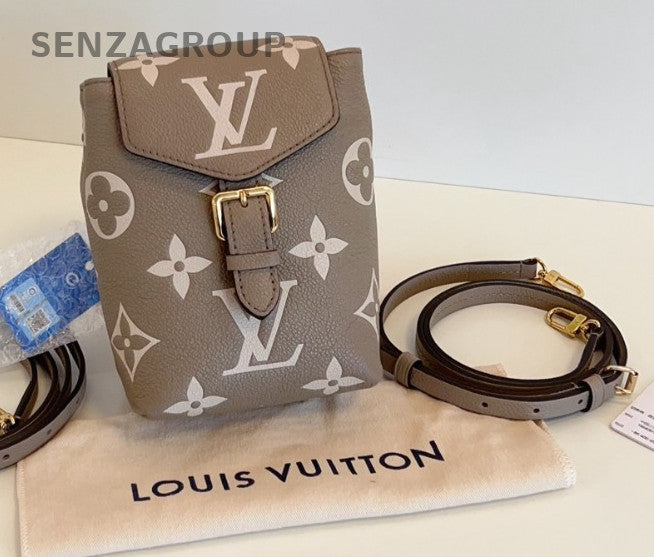 Louis Vuitton Tiny Backpack mini Elephant Grey Shoulder bag Almost BRAND NEW