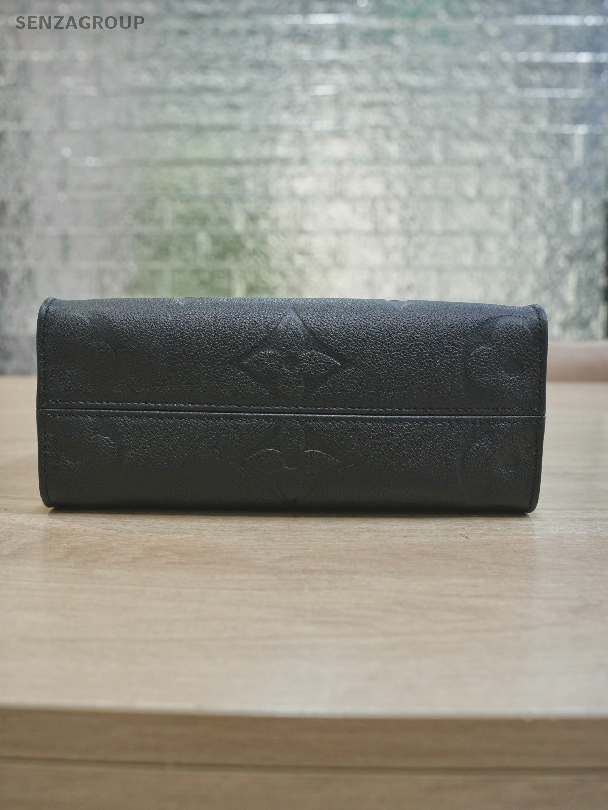 LOUIS VUITTON black Monogram Empriente ON THE GO PM almost brand new