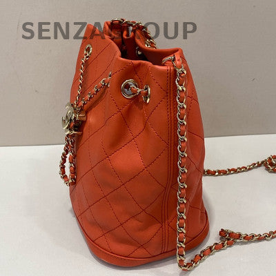 Chanel Quilted Drawstring Bucket Bag Red Gold Chain Shoulder Crossbody