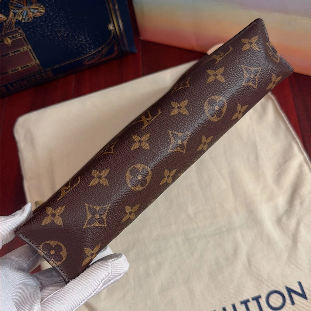 Louis Vuitton Toiletry Pouch Monogram Clutch Brown Gold Unisex Adults Classic
